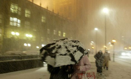 Snow falling in Westminster, London.