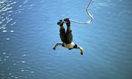 Man falling from bungee rope 