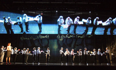 Bankers on stage in The Power of Yes