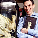 Allistair Mitchell with fake dragon