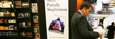 Man reading in Waterstone's