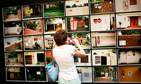 A visitor to Tate Modern's Global Cities exhibition