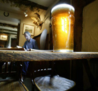 A pint of beer in a traditional pub