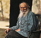 Hand-tinted photograph of Tolstoy dressed as a peasant
