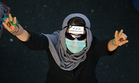 A supporter of defeated Iranian presidential candidate Mir Hossein Mousavi