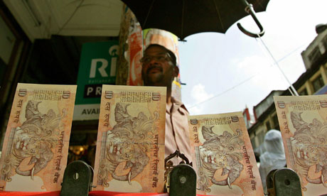 TO MATCH FEATURE ECONOMY-INDIA-CURRENCY