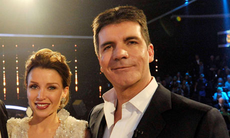 Simon Cowell with fellow The X Factor judge Dannii Minogue in 2010.