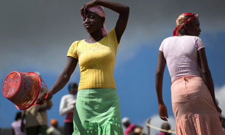 A woman shops for food in the market in Cornillon, Haiti