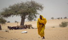 A-Sahel-woman-walks-after-003.jpg
