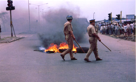 Police at a demonstration in India