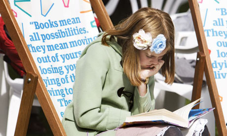 Girl reading in a deckchair at the Edinburgh International Books Festival