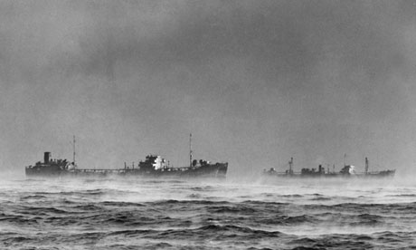 A convoy of ships passes through Arctic fog in 1945