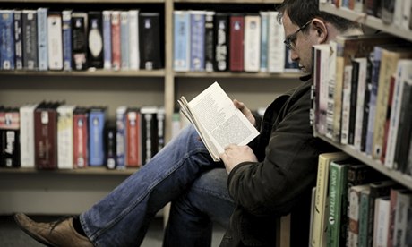 New chapter … a man reading a book at Ventnor library on the Isle of Wight.