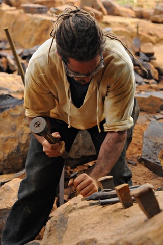 A man at work at Guédelon Castle