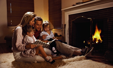 A family relaxing by the fireplace