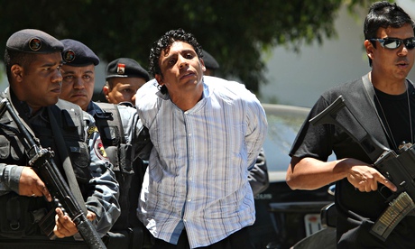 Antônio de Bonfim Lopes AKA Nem being arrested in November 2011