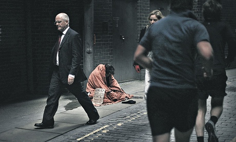 Broker on way to work, walking pass rough sleeper