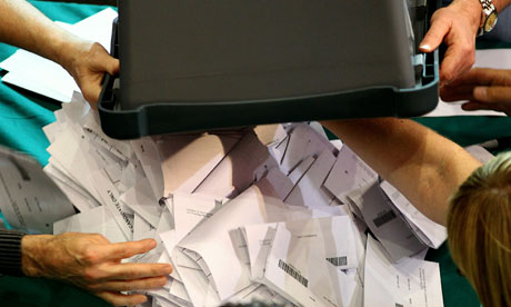Ballot papers are counted in