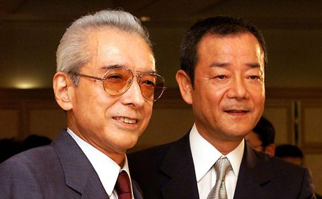 Nintendo's Hiroshi Yamauchi (left). Photograph: Shizuo Kambayashi/AP
