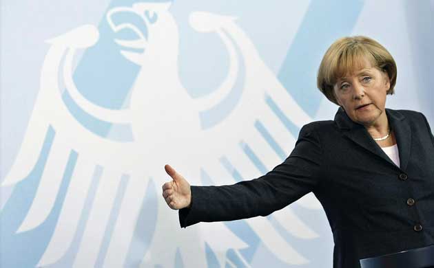 German chancellor Angela Merkel announces a rescue package for the country's banking system