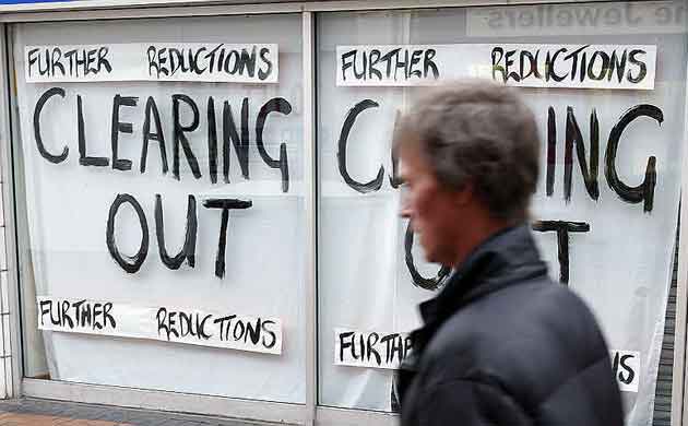 As the recession bites, a shop ceases trading in Birkenhead, north-west England