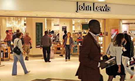 Shoppers walk past the John Lewis department store in the Victoria Centre, Nottingham
