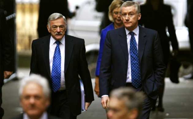 Royal Bank of Scotland chairman Tom McKillop and outgoing chief executive Fred Goodwin arrive for a shareholders meeting in Edinburgh