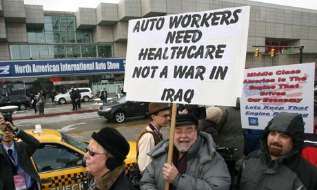 Protesting car workers outside the Detroit motor show  
