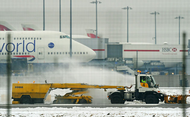 A snow plow a Heathrow Airport, December 21, 2010. 