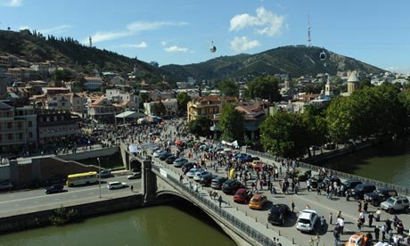 Georgians walk during the annual celebration in Tbilisi
