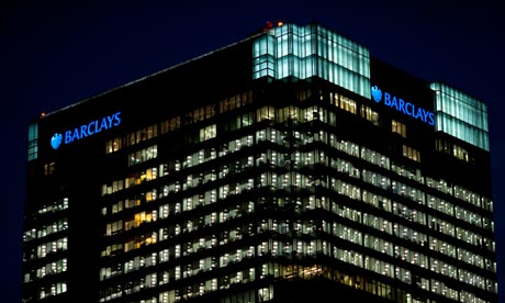  Barclays bank building at night in Canary Wharf, London