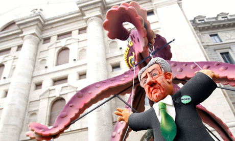 A puppet of Italian Prime Minister Monti is hung in front of Milan's stock exchange.
