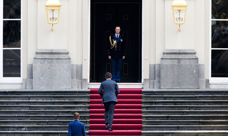 Dutch Prime Minister Mark Rutte arrives at the Royal palace to meet Queen Beatrix.