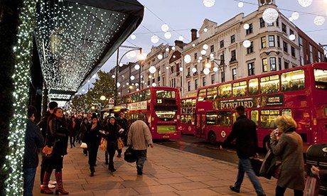 Christmas lights and shoppers on Oxford Street, London