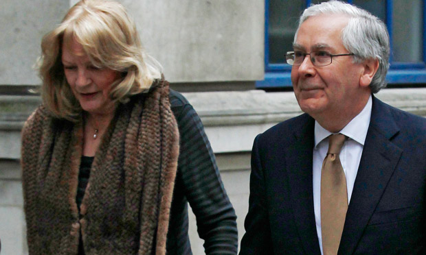 Governor of the Bank of England Mervyn King arrives with wife Barbara Melander to speak at the LSE