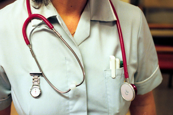 Gallery Apprenticeships: Barnet Hospital. Ward nurse with stethoscope and fob watch