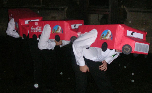 Student fancy dress: Students wearing a homemade Coca Cola lorry outfit