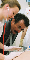 Sheffield Hallam's chancellor, Lord Winston, joins trainee nurses examining a £25,000 medical mannequin at the official opening of the £16m faculty of health and wellbeing. 