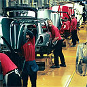 Manufacturing workers at a car plant