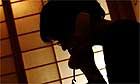 A woman on the phone to a helpline