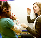 Polly and Isabella Burton, sign language