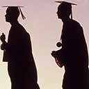 University guide 2009: Graduates in mortarboards and gowns in silhouette