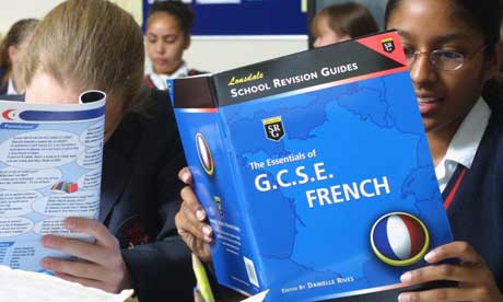 Children using modern languages schoolbooks in the classroom