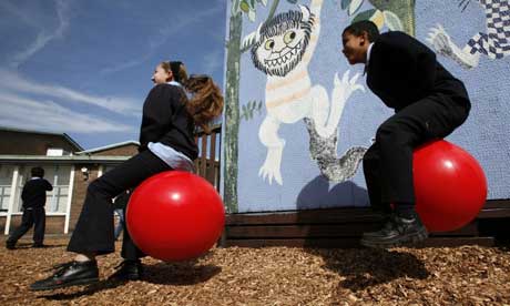 Children playing in the playground at St Elizabeth Catholic primary school, Bethnal Green, east London