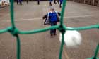 Children playing in the playground at Burlington primary school at Kirby-in-Furness in Cumbria