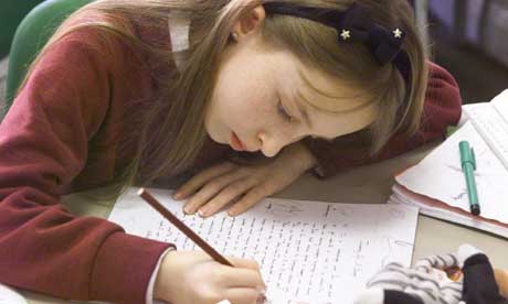 School pupil writing