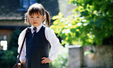 Girl in uniform goes back to school