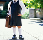 Girl in uniform goes back to school