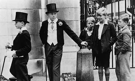 eton college uniform. Eton boys in top hats, London,