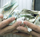 Hands full of money